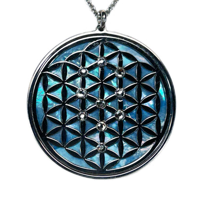 FIORE DELLA VITA, CIONDOLO CON SFONDO IN MADREPERLA NATURALE. GIOIELLO SPIRITUALE GEOMETRIE SACRE.